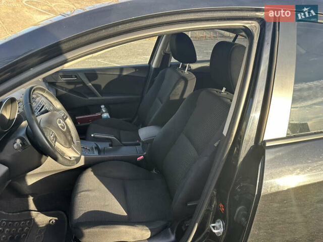 Чорний Мазда 3, об'ємом двигуна 1.6 л та пробігом 188 тис. км за 7400 $, фото 6 на Automoto.ua
