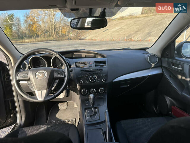 Чорний Мазда 3, об'ємом двигуна 1.6 л та пробігом 188 тис. км за 7400 $, фото 14 на Automoto.ua