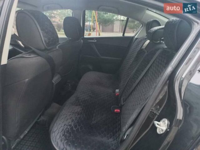 Черный Мазда 3, объемом двигателя 1.6 л и пробегом 257 тыс. км за 7850 $, фото 35 на Automoto.ua