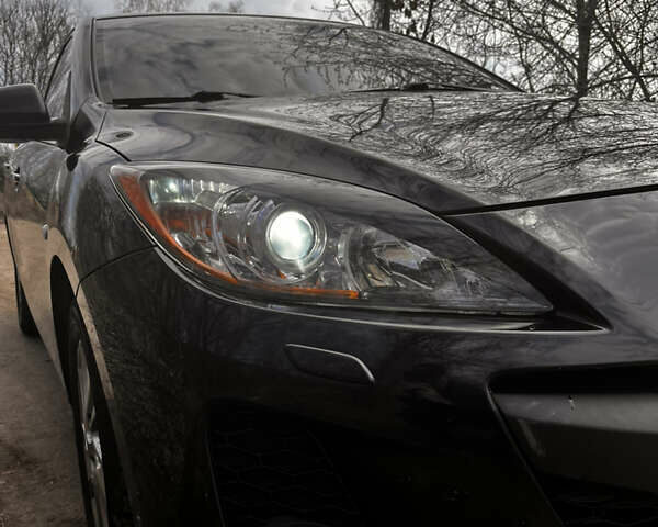 Чорний Мазда 3, об'ємом двигуна 1.6 л та пробігом 245 тис. км за 6800 $, фото 3 на Automoto.ua