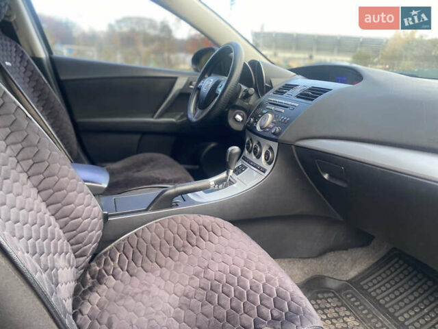 Чорний Мазда 3, об'ємом двигуна 1.6 л та пробігом 256 тис. км за 6999 $, фото 24 на Automoto.ua