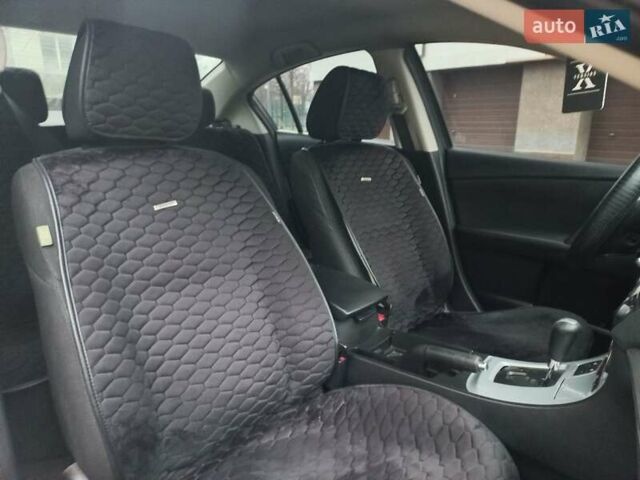 Черный Мазда 3, объемом двигателя 1.6 л и пробегом 257 тыс. км за 7850 $, фото 24 на Automoto.ua