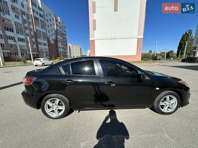 Черный Мазда 3, объемом двигателя 1.6 л и пробегом 185 тыс. км за 7600 $, фото 4 на Automoto.ua