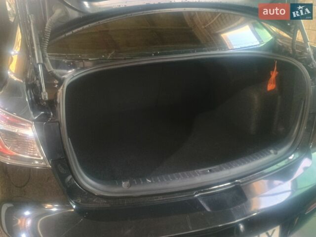 Чорний Мазда 3, об'ємом двигуна 2 л та пробігом 326 тис. км за 6000 $, фото 7 на Automoto.ua