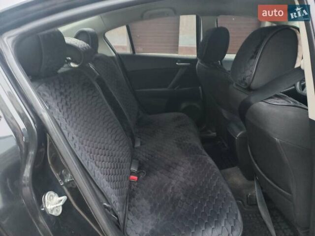 Черный Мазда 3, объемом двигателя 1.6 л и пробегом 257 тыс. км за 7850 $, фото 34 на Automoto.ua
