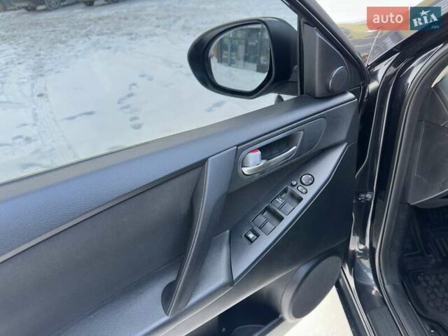 Черный Мазда 3, объемом двигателя 1.6 л и пробегом 258 тыс. км за 7600 $, фото 13 на Automoto.ua