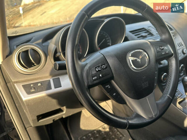 Чорний Мазда 3, об'ємом двигуна 1.6 л та пробігом 188 тис. км за 7400 $, фото 7 на Automoto.ua