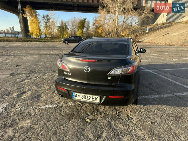 Чорний Мазда 3, об'ємом двигуна 1.6 л та пробігом 188 тис. км за 7400 $, фото 11 на Automoto.ua
