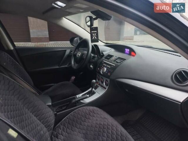 Черный Мазда 3, объемом двигателя 1.6 л и пробегом 257 тыс. км за 7850 $, фото 25 на Automoto.ua