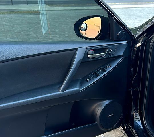 Чорний Мазда 3, об'ємом двигуна 2 л та пробігом 140 тис. км за 7700 $, фото 6 на Automoto.ua