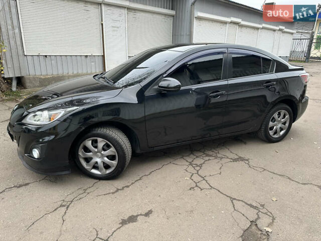 Черный Мазда 3, объемом двигателя 2 л и пробегом 280 тыс. км за 6700 $, фото 4 на Automoto.ua