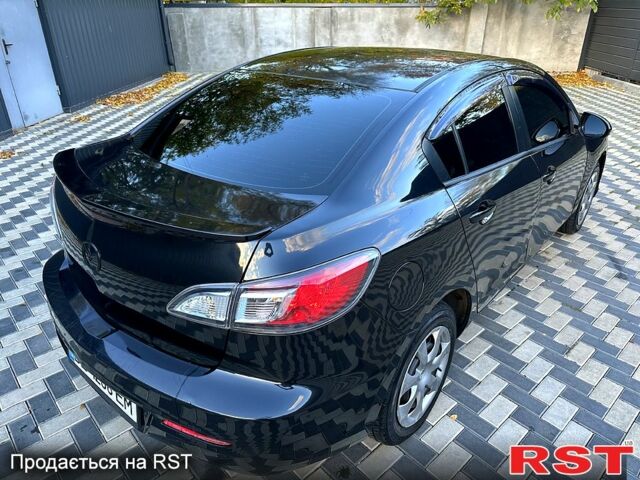 Черный Мазда 3, объемом двигателя 2 л и пробегом 280 тыс. км за 6950 $, фото 5 на Automoto.ua