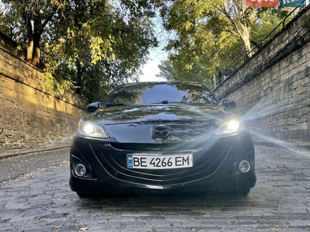 Черный Мазда 3, объемом двигателя 2 л и пробегом 280 тыс. км за 7000 $, фото 4 на Automoto.ua