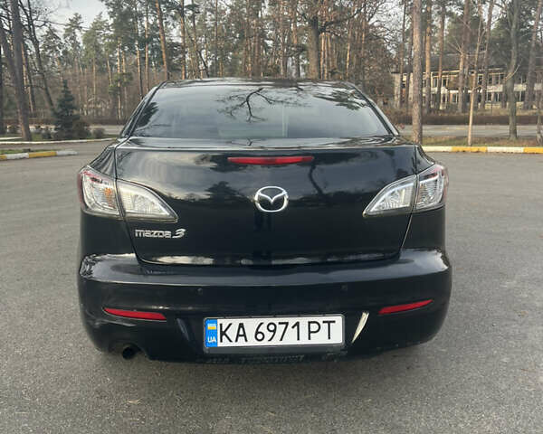 Чорний Мазда 3, об'ємом двигуна 2 л та пробігом 195 тис. км за 7600 $, фото 1 на Automoto.ua