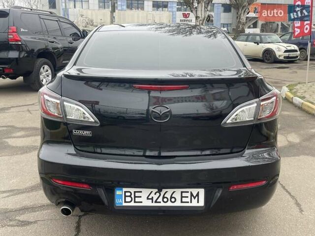 Черный Мазда 3, объемом двигателя 2 л и пробегом 284 тыс. км за 7300 $, фото 4 на Automoto.ua