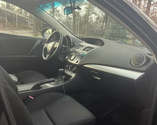 Чорний Мазда 3, об'ємом двигуна 2 л та пробігом 195 тис. км за 7600 $, фото 6 на Automoto.ua