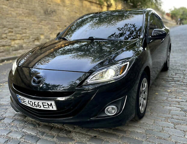 Черный Мазда 3, объемом двигателя 2 л и пробегом 280 тыс. км за 7000 $, фото 3 на Automoto.ua