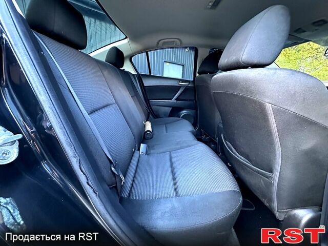 Черный Мазда 3, объемом двигателя 2 л и пробегом 280 тыс. км за 6950 $, фото 12 на Automoto.ua