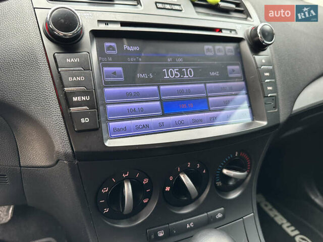 Черный Мазда 3, объемом двигателя 2 л и пробегом 280 тыс. км за 6700 $, фото 24 на Automoto.ua