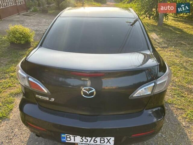 Чорний Мазда 3, об'ємом двигуна 1.6 л та пробігом 180 тис. км за 6900 $, фото 9 на Automoto.ua