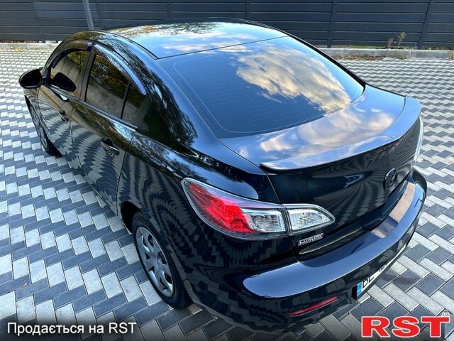 Черный Мазда 3, объемом двигателя 2 л и пробегом 280 тыс. км за 6950 $, фото 3 на Automoto.ua