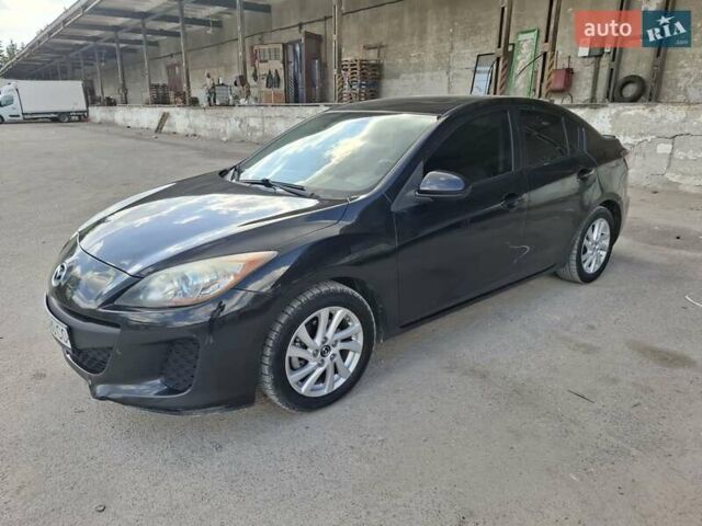 Черный Мазда 3, объемом двигателя 2 л и пробегом 264 тыс. км за 8500 $, фото 1 на Automoto.ua