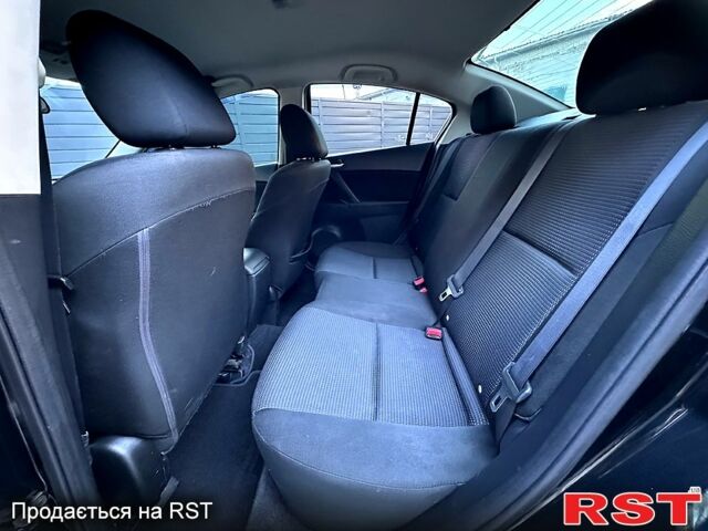 Черный Мазда 3, объемом двигателя 2 л и пробегом 280 тыс. км за 6950 $, фото 11 на Automoto.ua