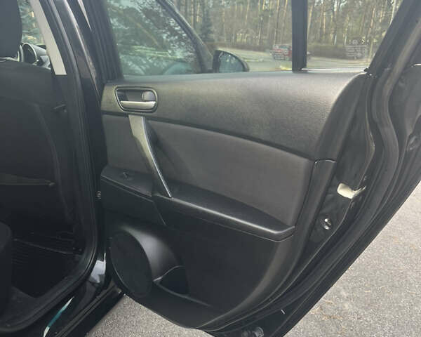 Чорний Мазда 3, об'ємом двигуна 2 л та пробігом 195 тис. км за 7600 $, фото 8 на Automoto.ua