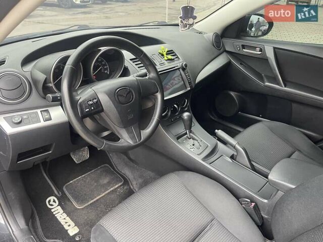 Черный Мазда 3, объемом двигателя 2 л и пробегом 284 тыс. км за 7300 $, фото 8 на Automoto.ua