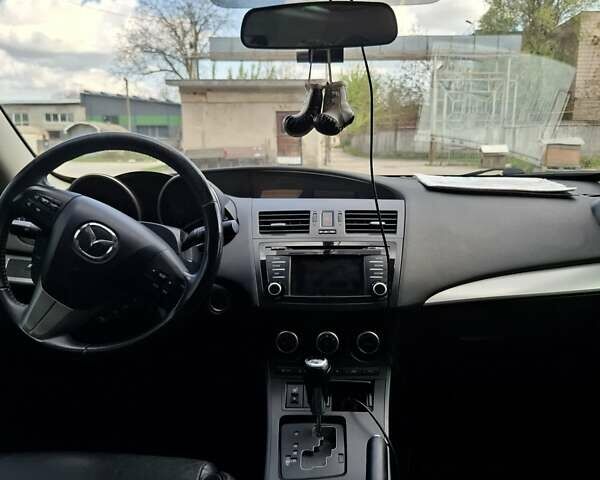 Черный Мазда 3, объемом двигателя 2 л и пробегом 264 тыс. км за 8500 $, фото 10 на Automoto.ua