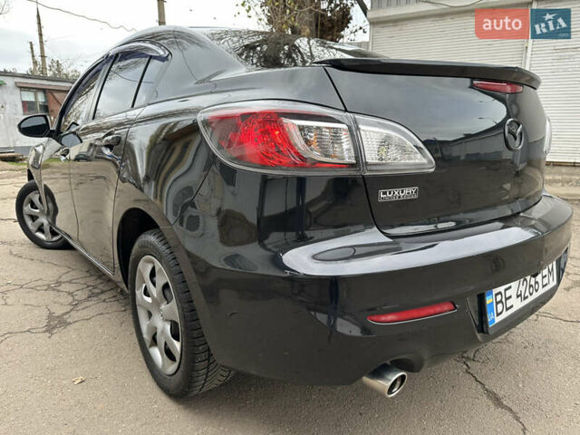 Черный Мазда 3, объемом двигателя 2 л и пробегом 280 тыс. км за 6700 $, фото 5 на Automoto.ua
