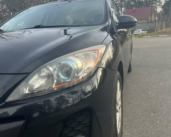 Чорний Мазда 3, об'ємом двигуна 2 л та пробігом 195 тис. км за 7600 $, фото 12 на Automoto.ua