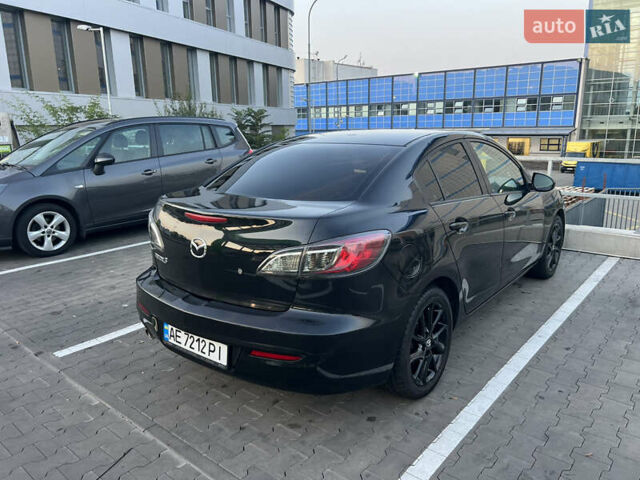 Черный Мазда 3, объемом двигателя 2 л и пробегом 235 тыс. км за 7400 $, фото 9 на Automoto.ua