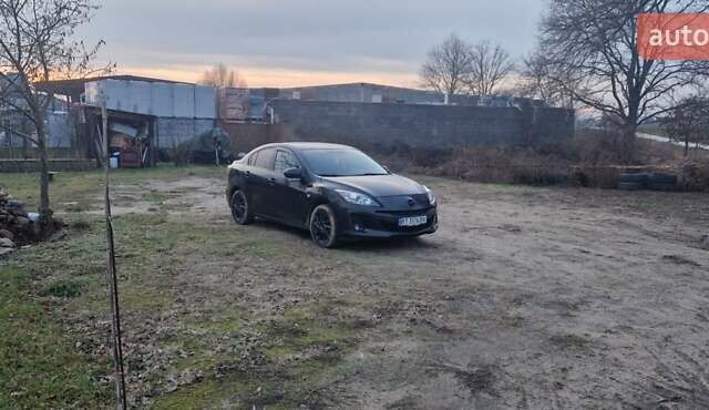 Черный Мазда 3, объемом двигателя 1.6 л и пробегом 180 тыс. км за 6300 $, фото 1 на Automoto.ua