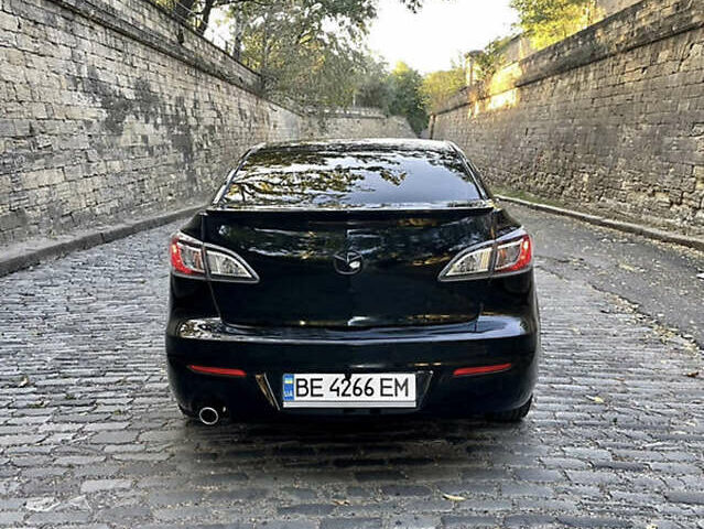 Черный Мазда 3, объемом двигателя 2 л и пробегом 280 тыс. км за 7000 $, фото 6 на Automoto.ua