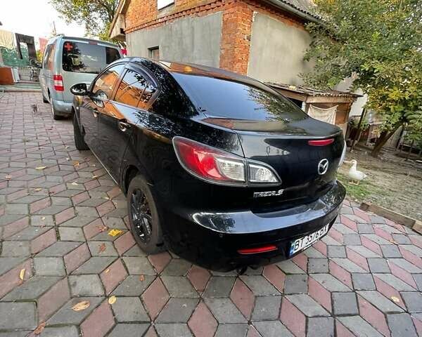 Чорний Мазда 3, об'ємом двигуна 1.6 л та пробігом 180 тис. км за 6900 $, фото 1 на Automoto.ua