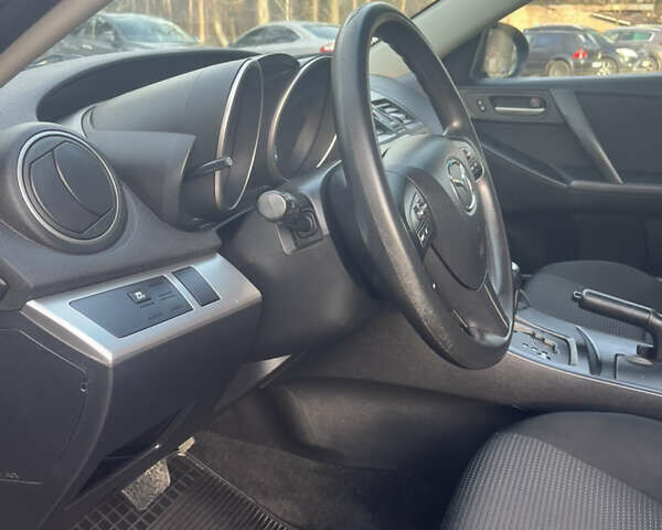 Чорний Мазда 3, об'ємом двигуна 2 л та пробігом 195 тис. км за 7600 $, фото 22 на Automoto.ua