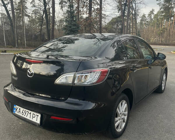 Чорний Мазда 3, об'ємом двигуна 2 л та пробігом 195 тис. км за 7600 $, фото 2 на Automoto.ua
