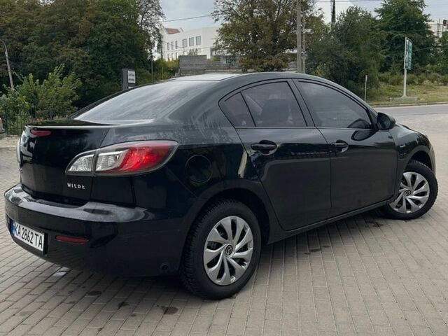 Черный Мазда 3, объемом двигателя 2 л и пробегом 230 тыс. км за 5550 $, фото 1 на Automoto.ua