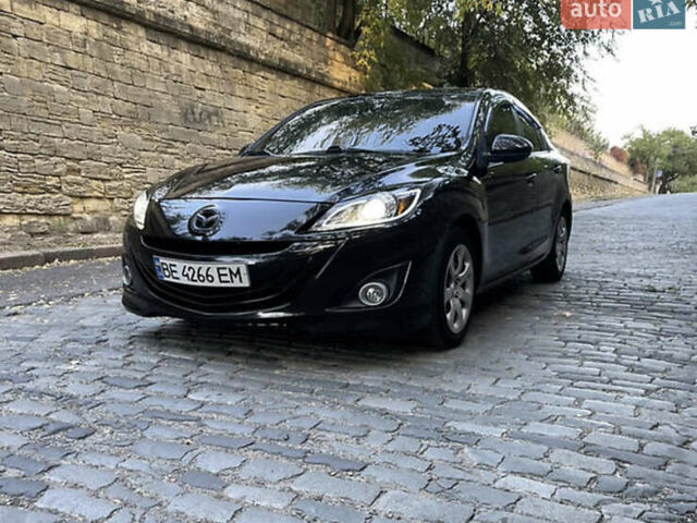 Черный Мазда 3, объемом двигателя 2 л и пробегом 280 тыс. км за 7000 $, фото 12 на Automoto.ua