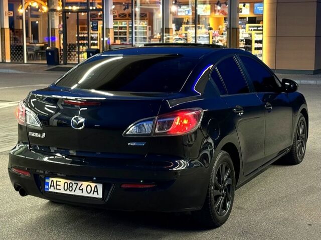 Чорний Мазда 3, об'ємом двигуна 2 л та пробігом 140 тис. км за 7700 $, фото 4 на Automoto.ua