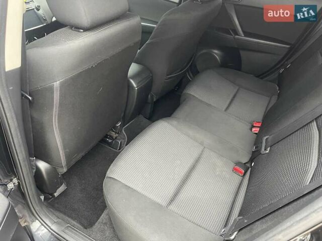 Черный Мазда 3, объемом двигателя 2 л и пробегом 284 тыс. км за 7300 $, фото 6 на Automoto.ua