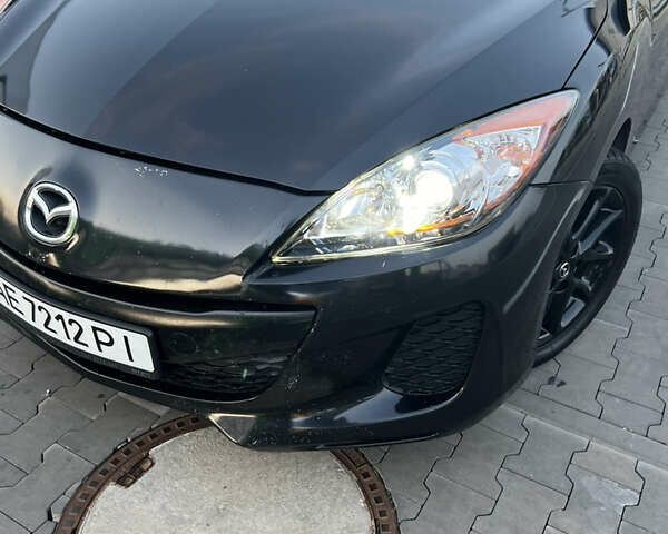 Черный Мазда 3, объемом двигателя 2 л и пробегом 235 тыс. км за 7400 $, фото 2 на Automoto.ua