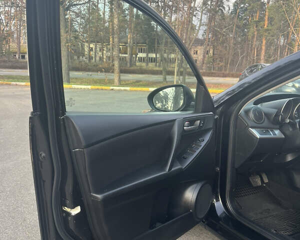 Чорний Мазда 3, об'ємом двигуна 2 л та пробігом 195 тис. км за 7600 $, фото 17 на Automoto.ua