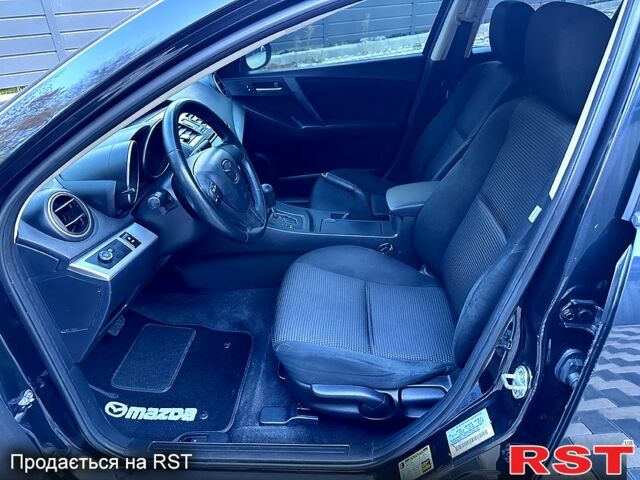 Черный Мазда 3, объемом двигателя 2 л и пробегом 280 тыс. км за 6950 $, фото 9 на Automoto.ua