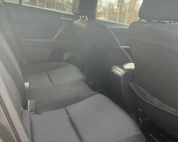 Чорний Мазда 3, об'ємом двигуна 2 л та пробігом 195 тис. км за 7600 $, фото 9 на Automoto.ua