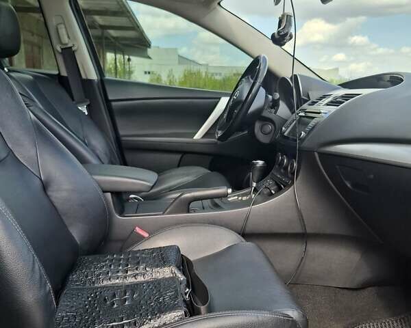 Черный Мазда 3, объемом двигателя 2 л и пробегом 264 тыс. км за 8500 $, фото 8 на Automoto.ua