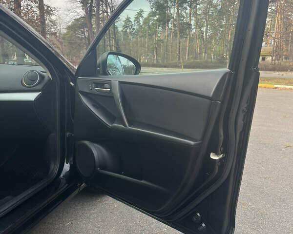 Чорний Мазда 3, об'ємом двигуна 2 л та пробігом 195 тис. км за 7600 $, фото 7 на Automoto.ua