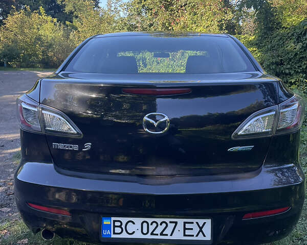 Черный Мазда 3, объемом двигателя 2 л и пробегом 230 тыс. км за 8500 $, фото 5 на Automoto.ua
