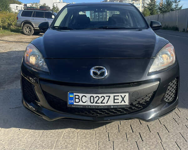 Черный Мазда 3, объемом двигателя 2 л и пробегом 230 тыс. км за 8500 $, фото 1 на Automoto.ua